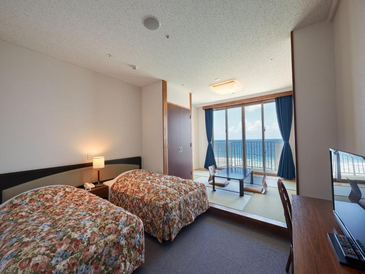 Hotel Miyuki Beach Onna Buitenkant foto