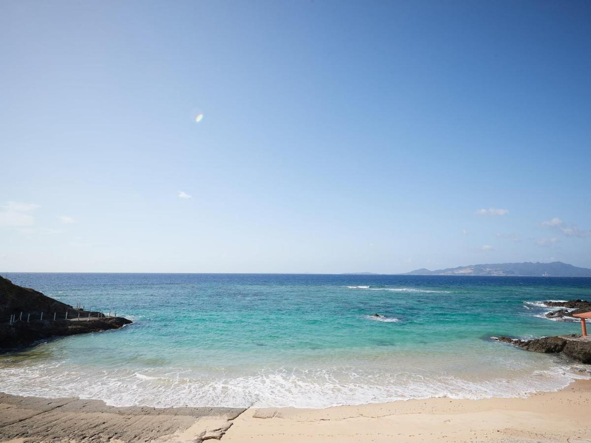Hotel Miyuki Beach Onna Buitenkant foto