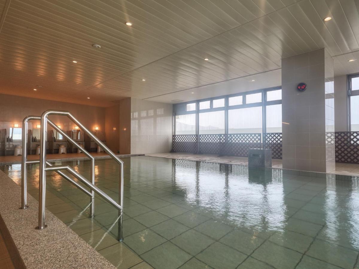 Hotel Miyuki Beach Onna Buitenkant foto